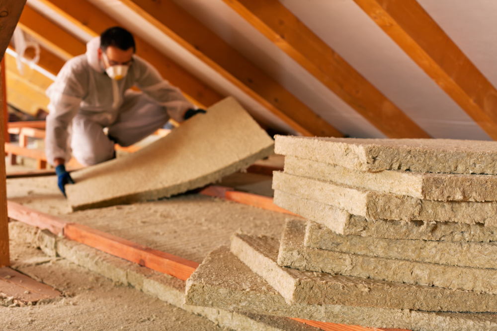 installing insulation in the attic