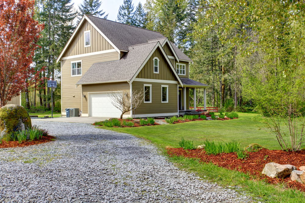 home at the end of a gravel driveway