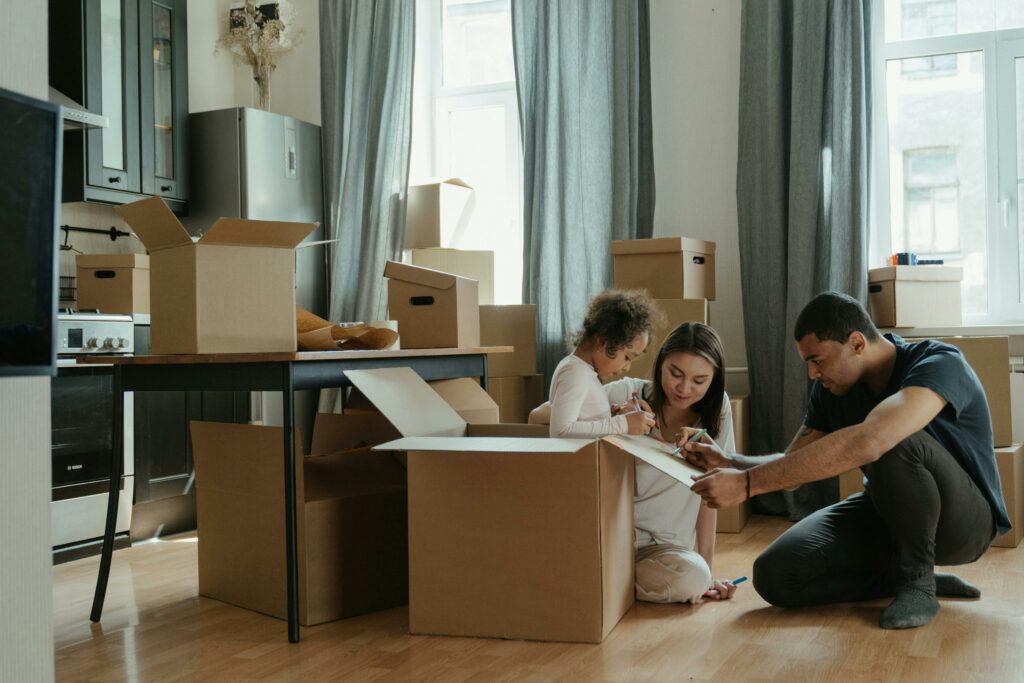 Image of a family moving into a home.