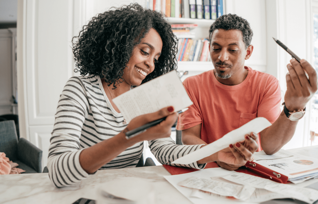 Image of a couple setting a budget.