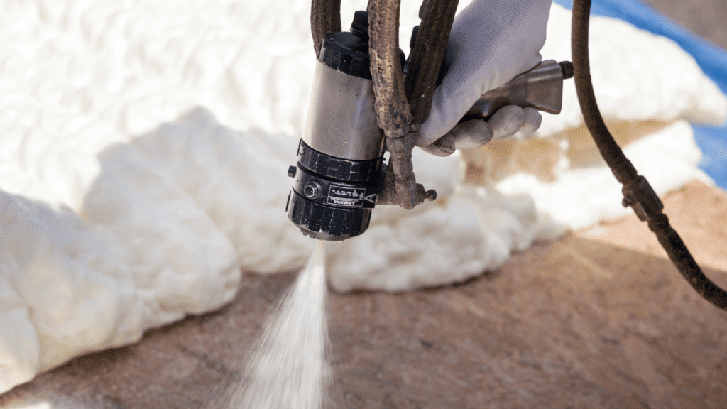 Image of spray foam being applied to the floor.